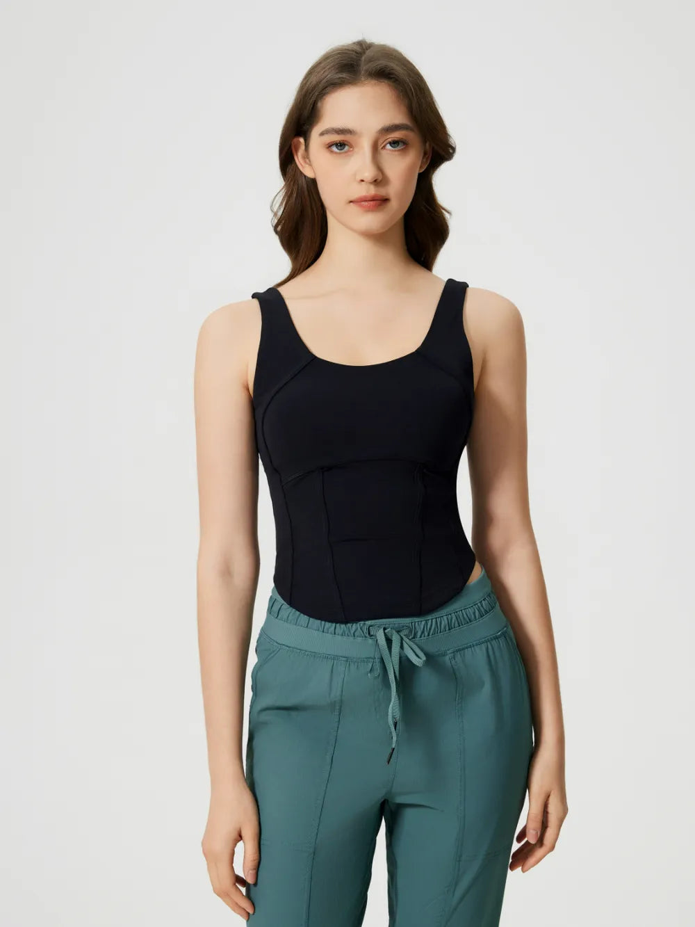 Round neck wide strap padded active tank profile view