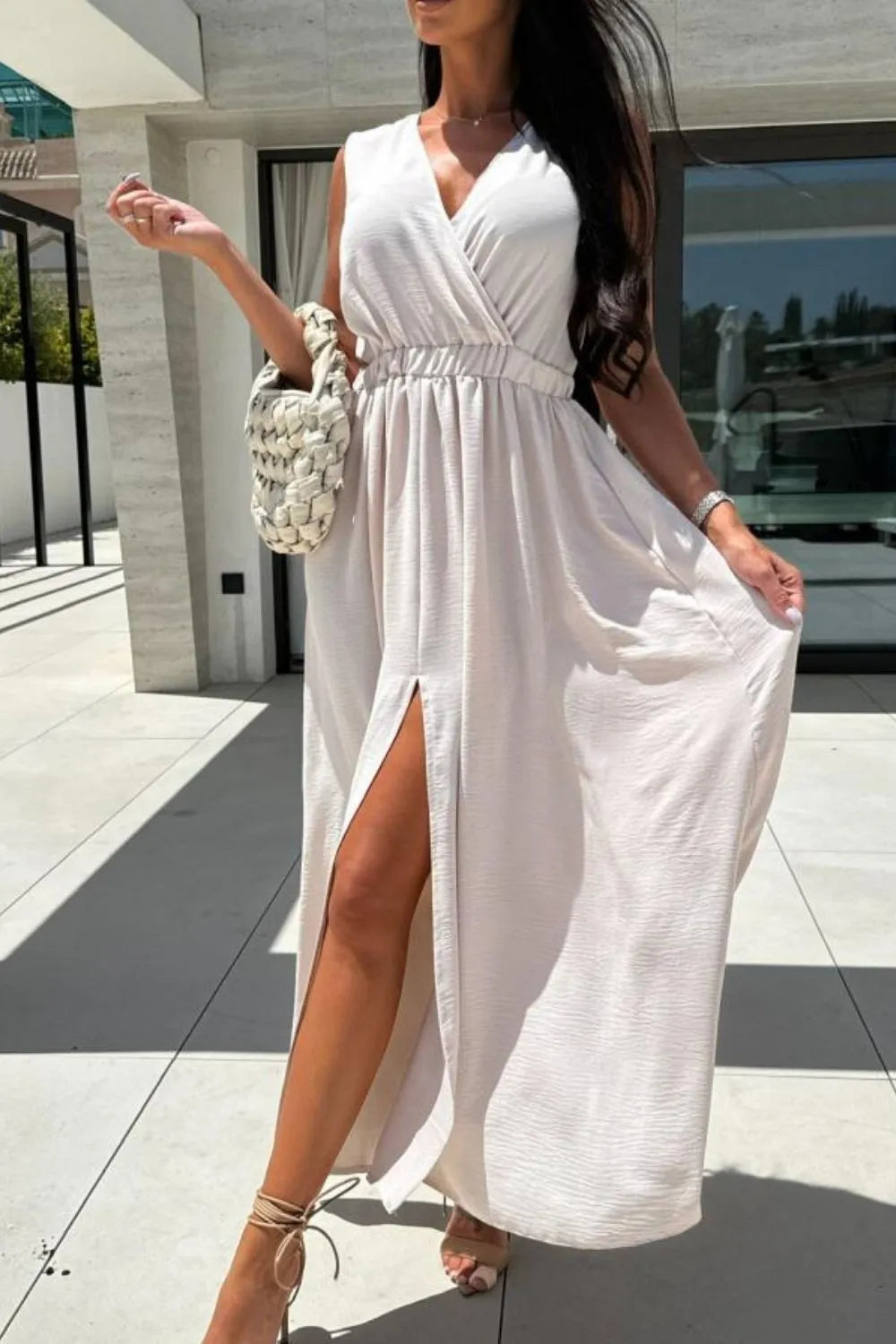 sleeveless surplice wrap maxi dress with leg slit back view