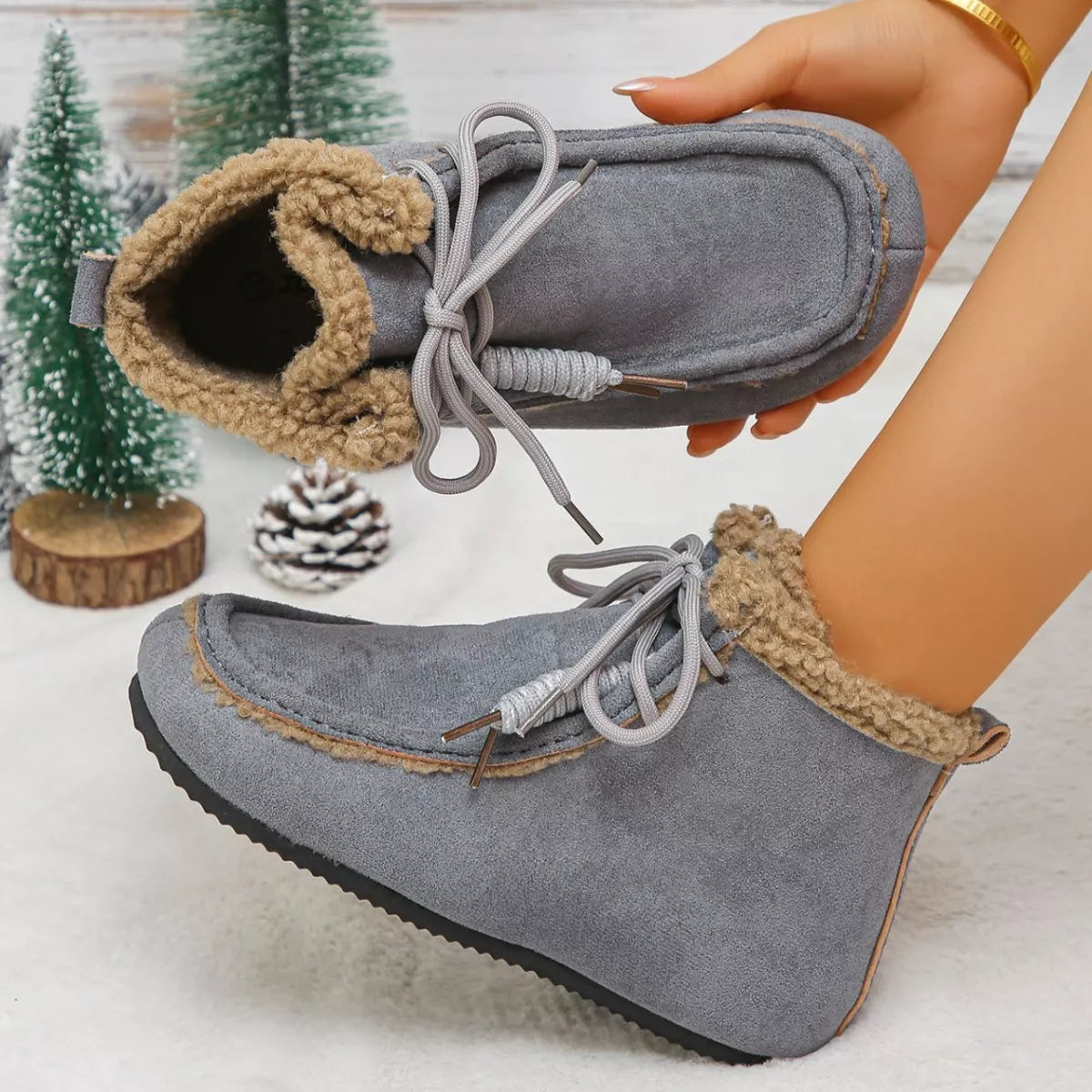 Plush lined ankle boots material close up