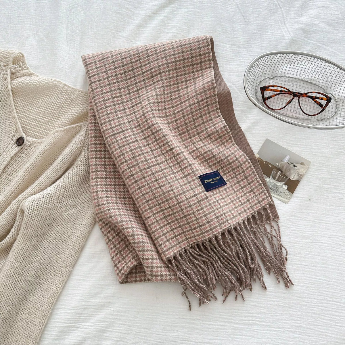 Plaid fringe scarf shown looped for a cozy look