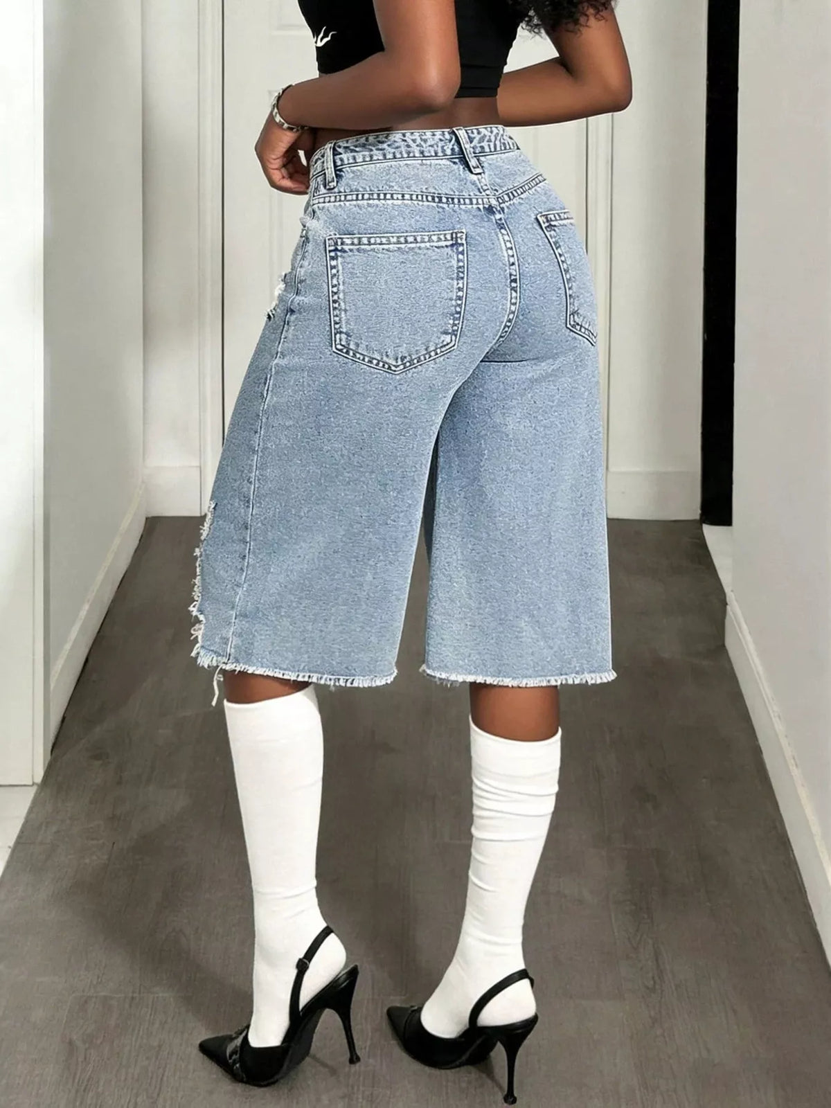 Wide leg knee length shorts shown from the front