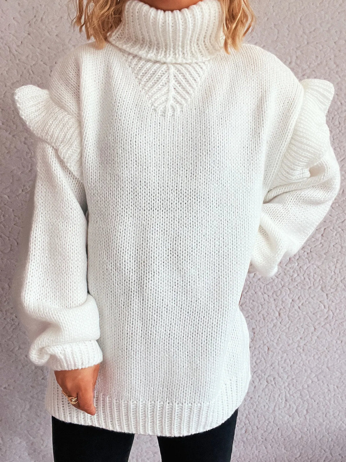 Ruffled turtleneck long sleeve sweater close up detail