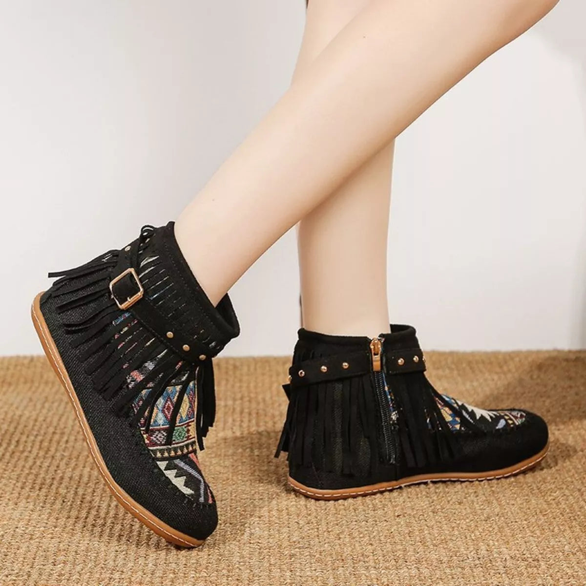 Fringe side zipper ankle boots, sole detail