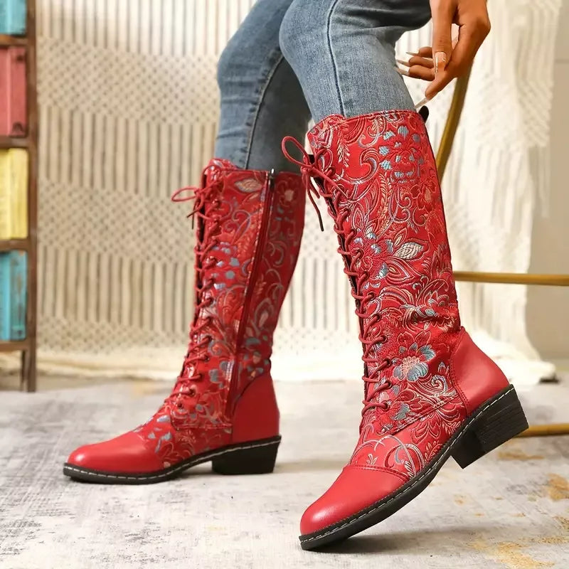 Embroidered knee high boots front view