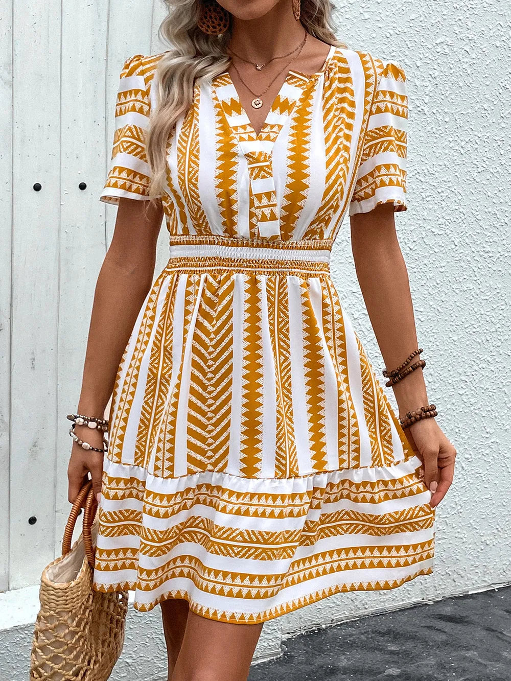 Mustard geometric notched short sleeve mini dress front view