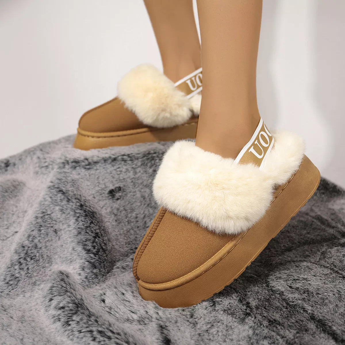 Round toe platform ankle boots in suede heel close up