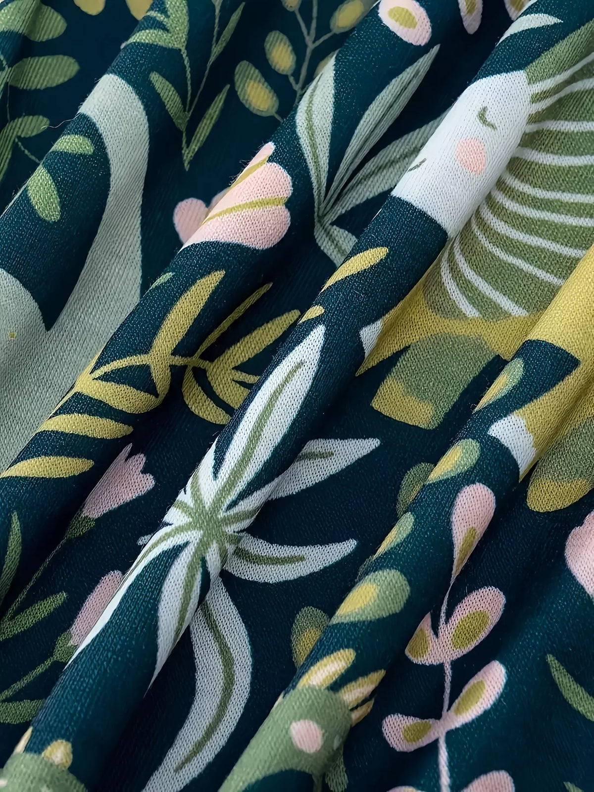 Side view of the flowing printed midi skirt