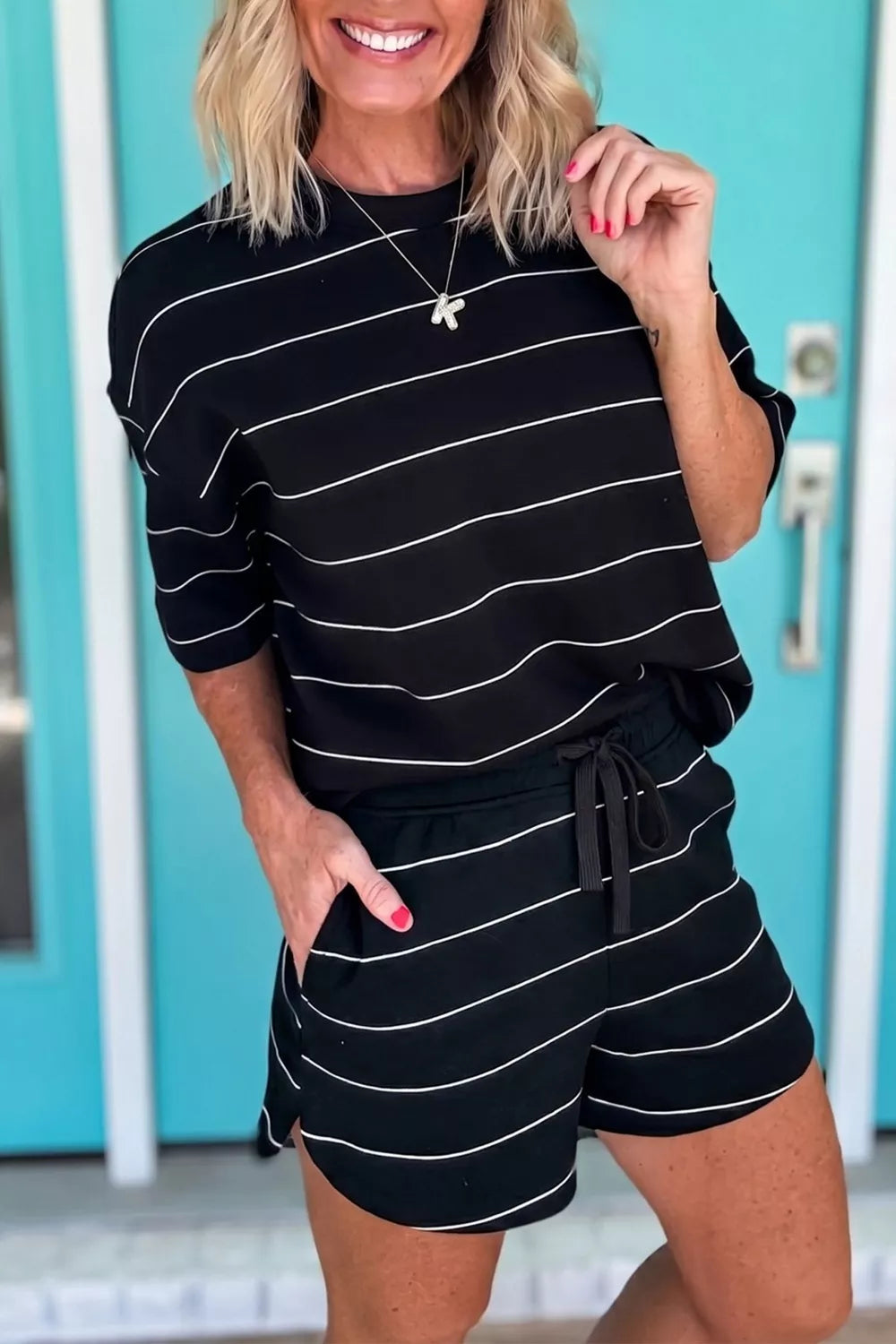 Black striped two piece top and shorts set side detail