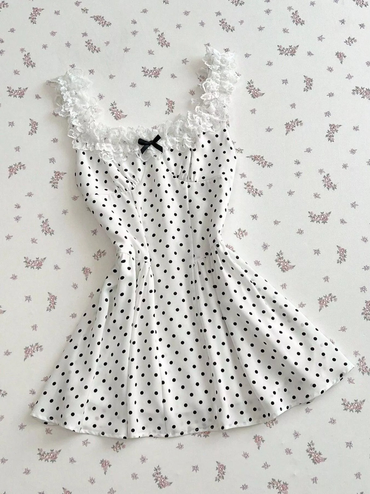 Polka dot mini dress styled for a summer afternoon