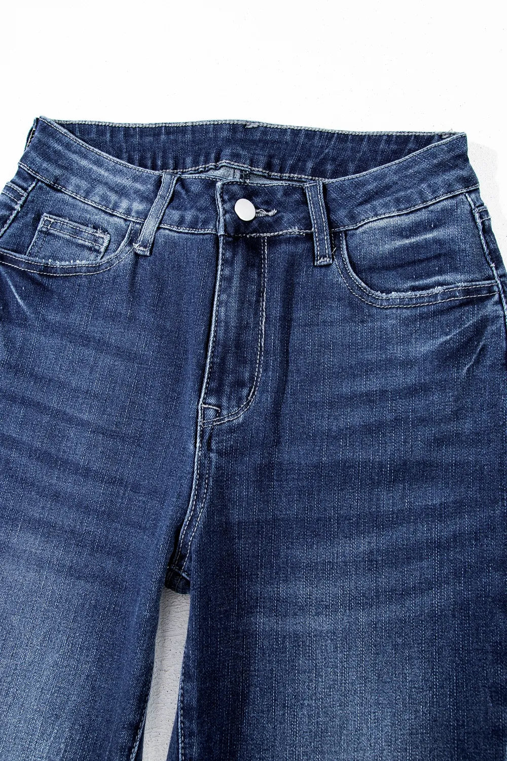 Model wearing mineral wash flare jeans