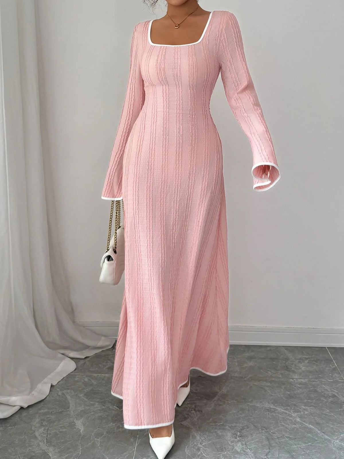 Side view of the fitted maxi dress