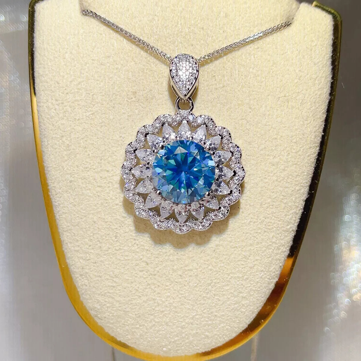 Close up of the royal blue moissanite stone and silver setting