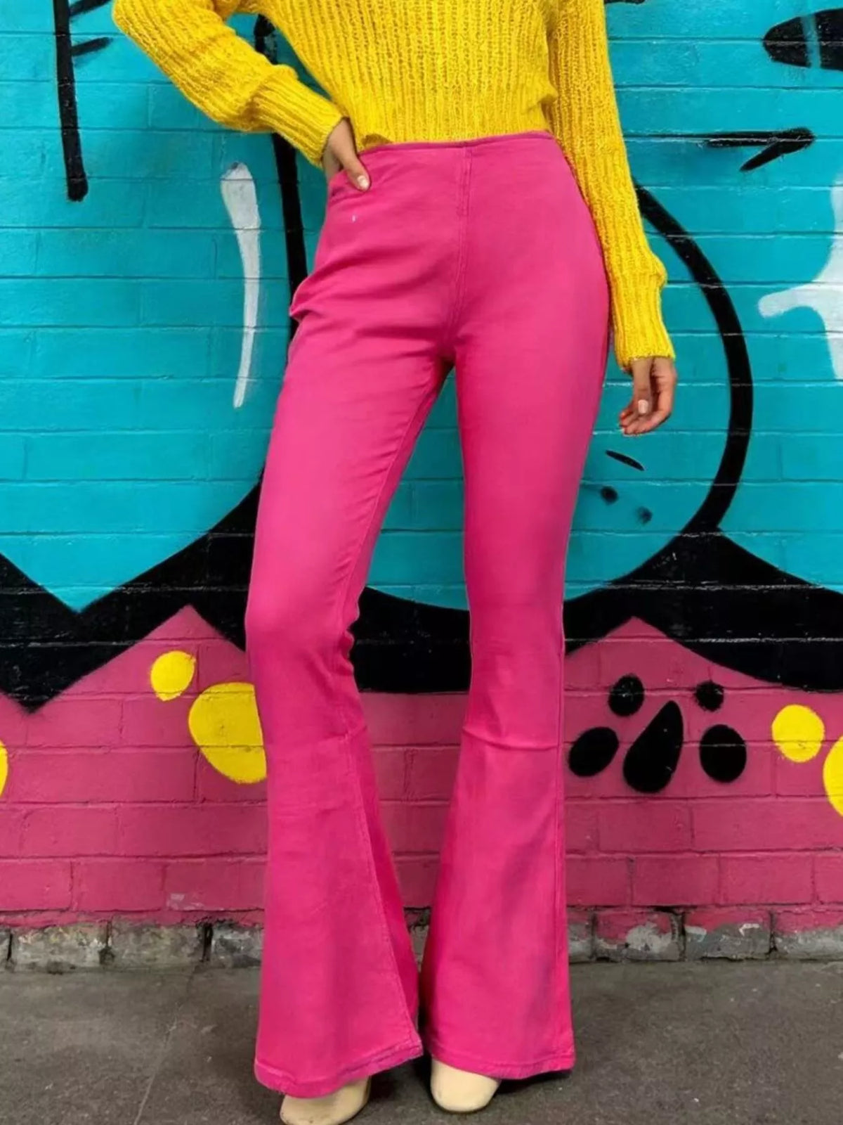 Model wearing flare jeans