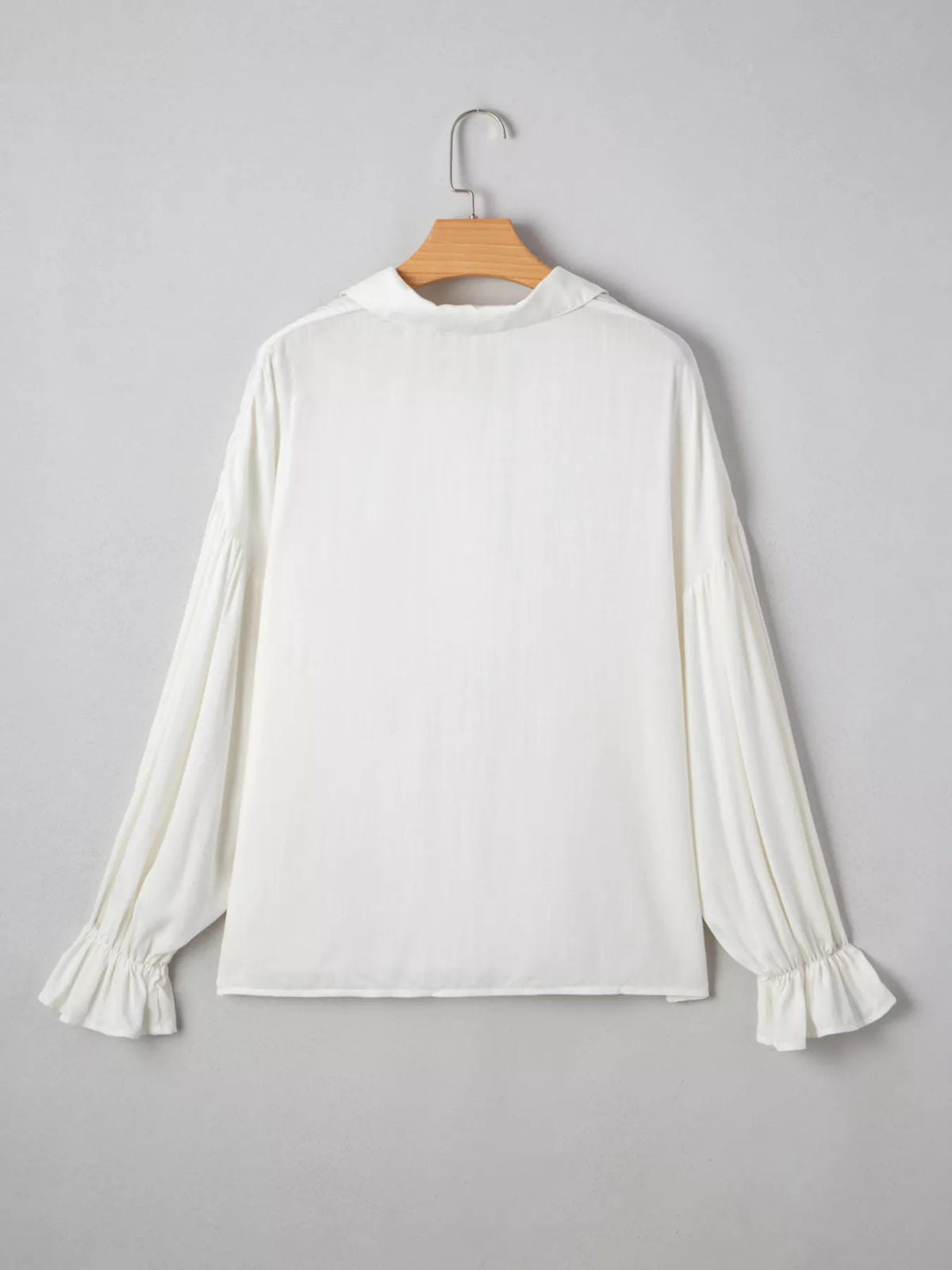 Button front ruffle shirt collar detail