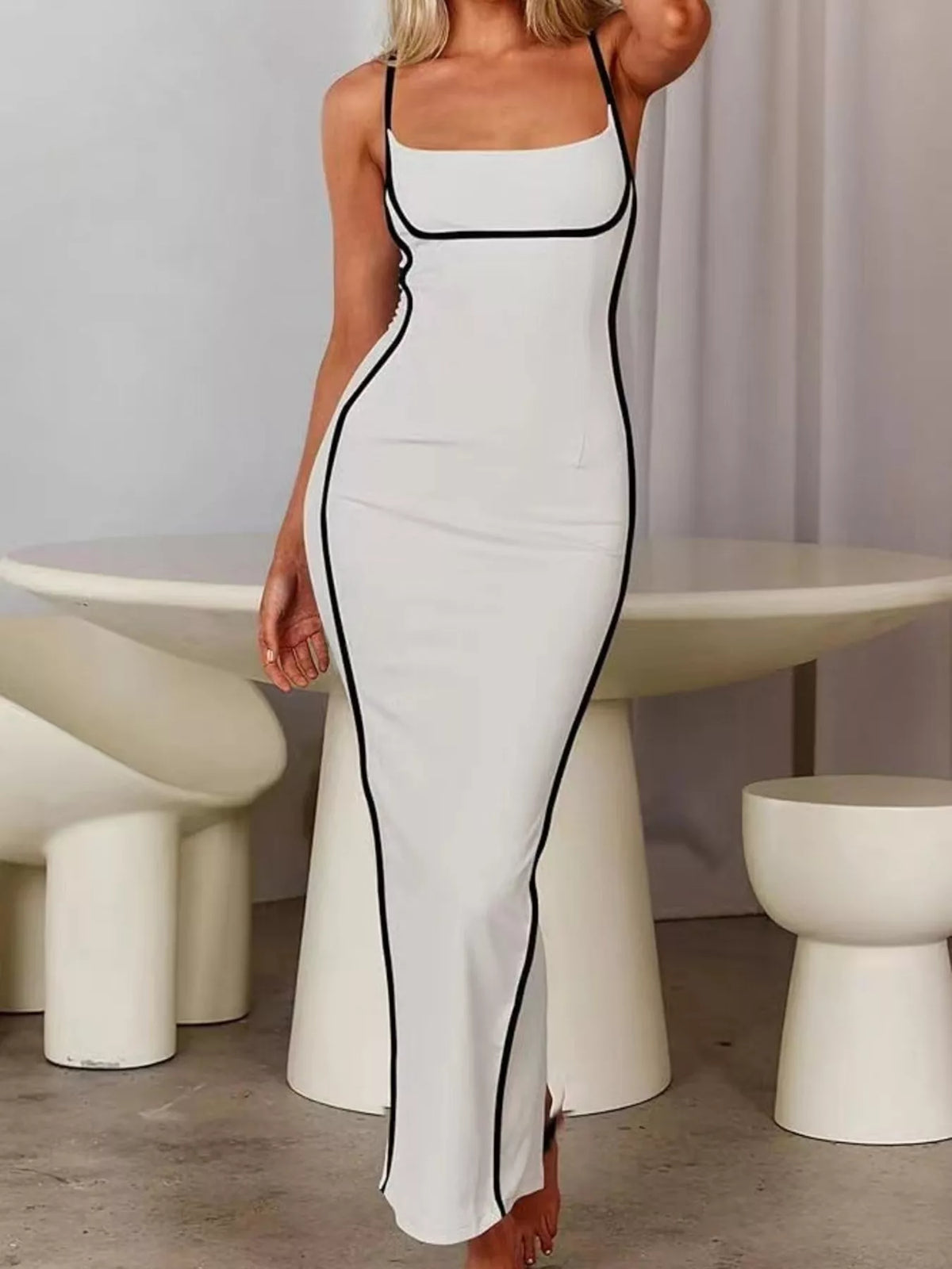 Detail of the strap and trim stitching on the dress