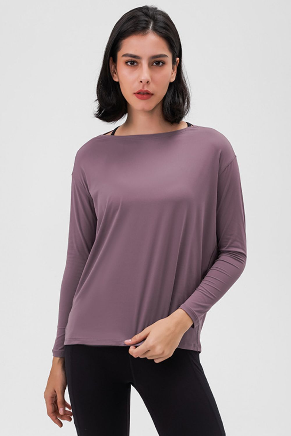 Loose fit active pullover top side view