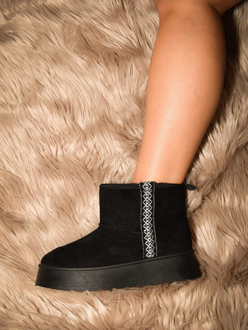 Black suede platform boots front view