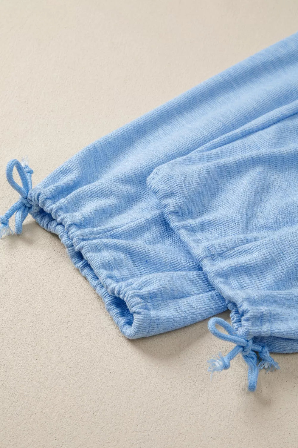 Light blue jogger set outfit detail