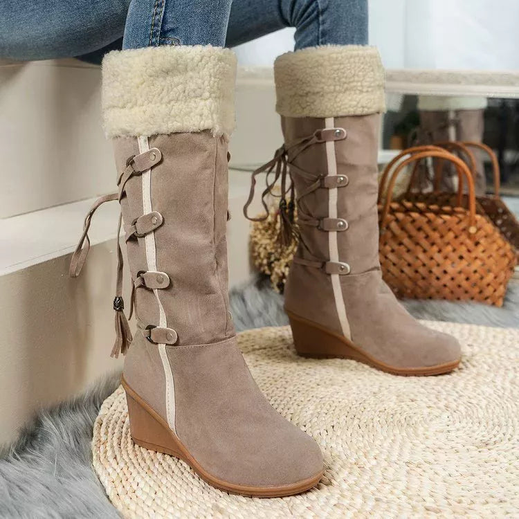 Round toe wedge boots heel and sole detail