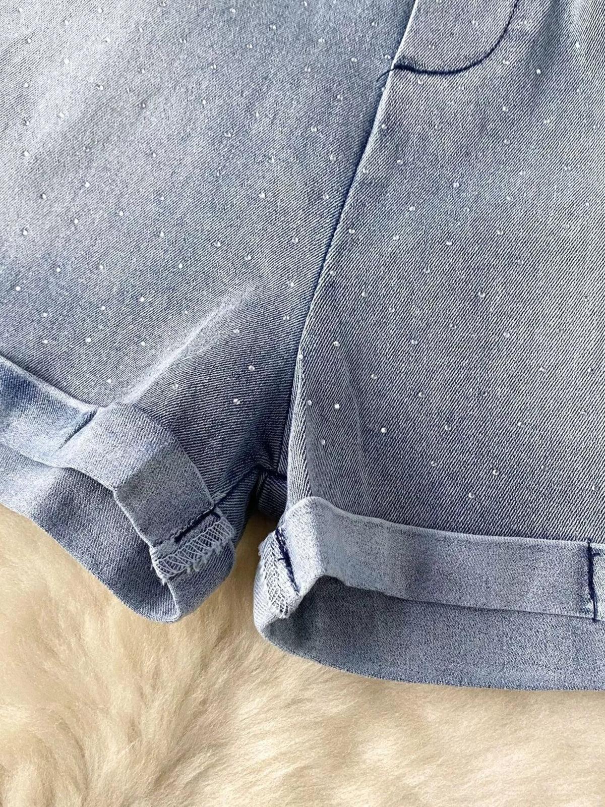 Blue strapless denim romper with diamante detail styled view