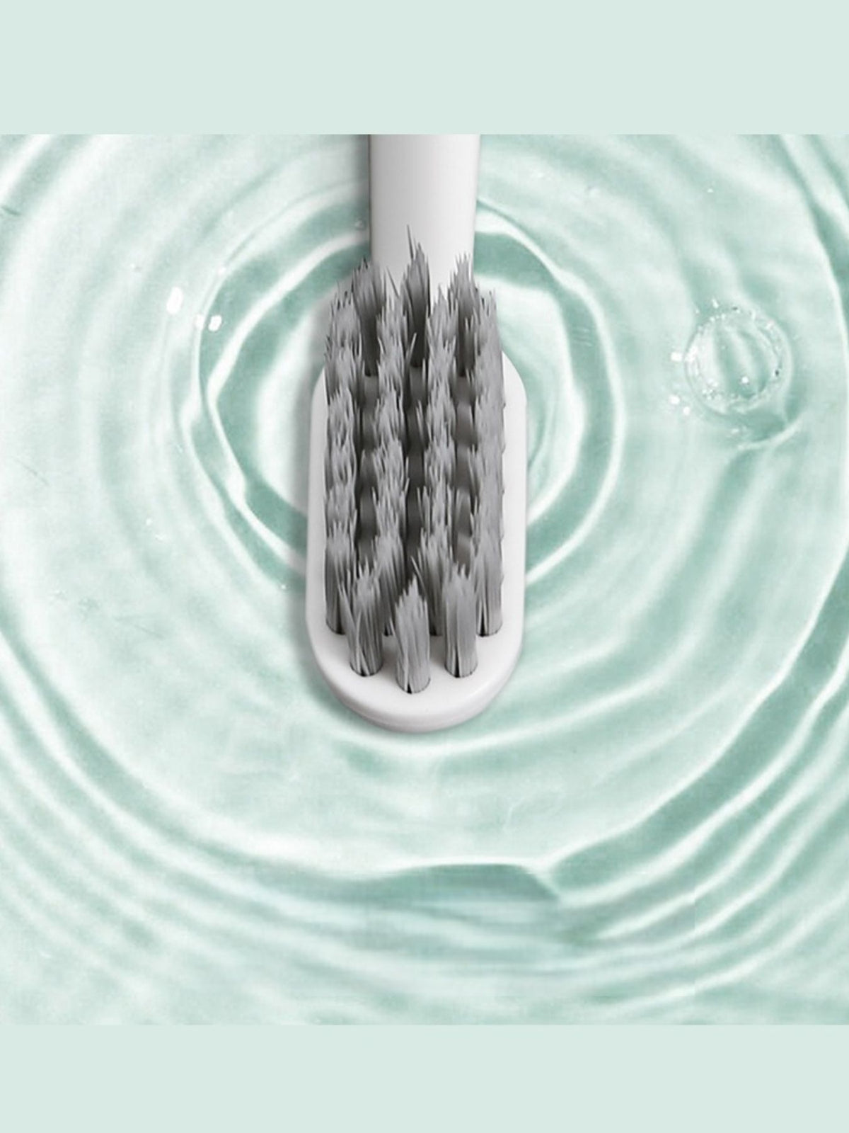 Electric toothbrush in white