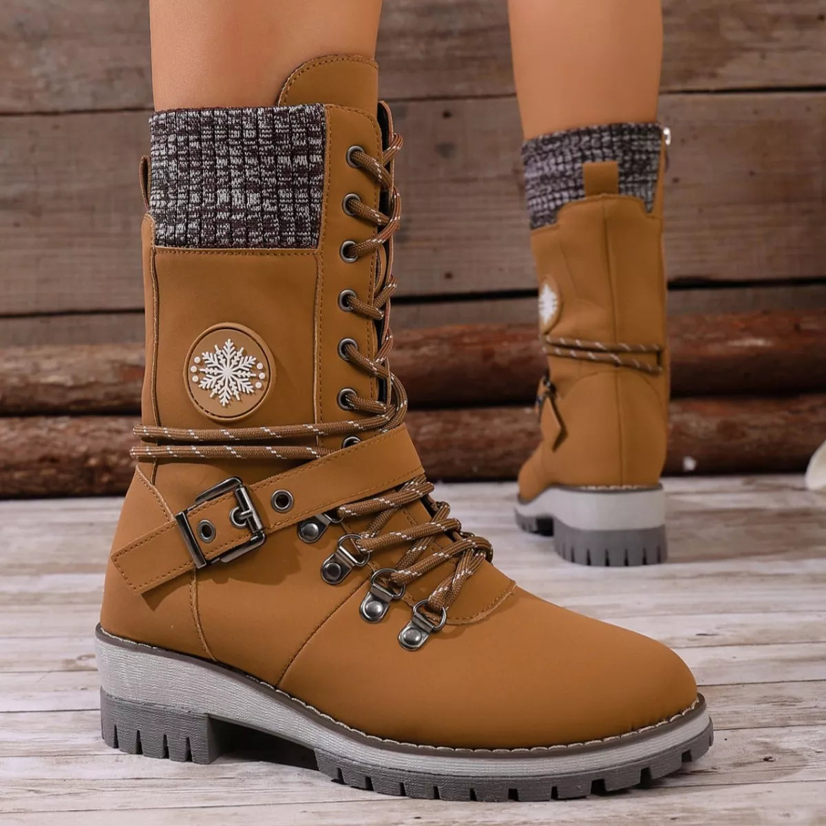 Lace up combat ankle boots worn on model