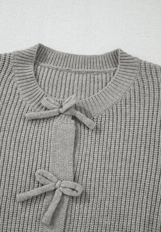 Round neck cardigan fabric drape detail