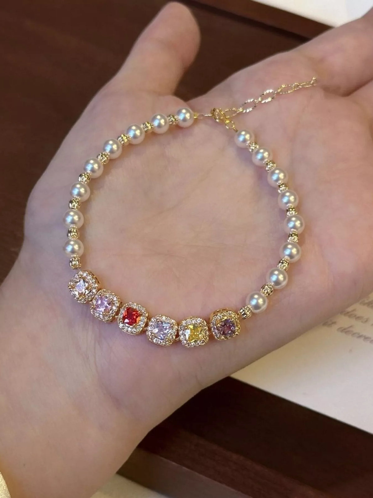 Pearl and zircon gold adjustable bracelet full length view