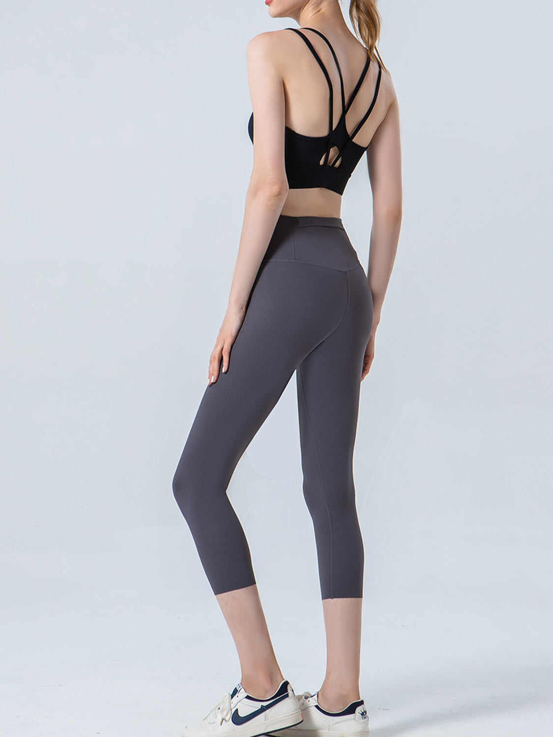 Wide waistband cropped sports leggings styled front view 17