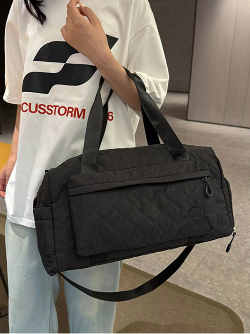 Black quilted Oxford cloth travel duffel bag