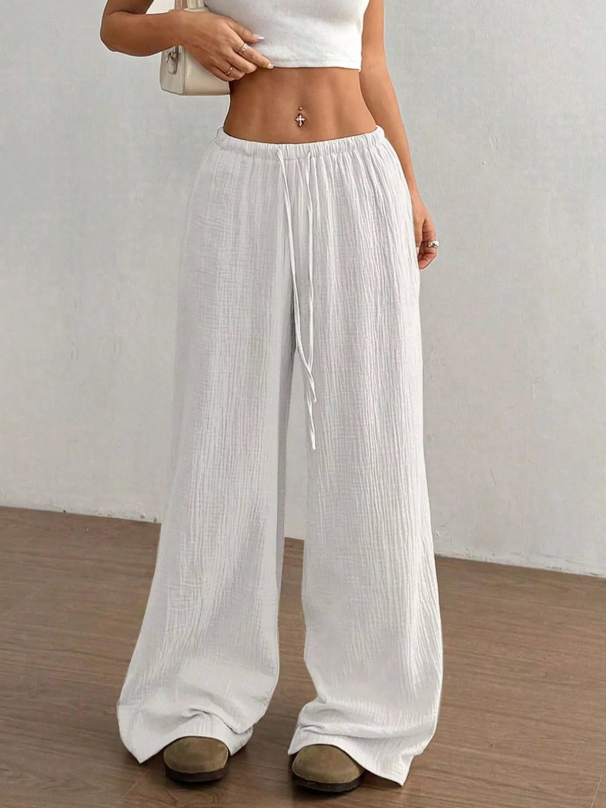 Cotton wide leg pants shown from the side