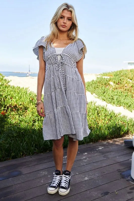 Jacquard V Neck Flutter Sleeve Tiered Dress in Black and Ivory view 9