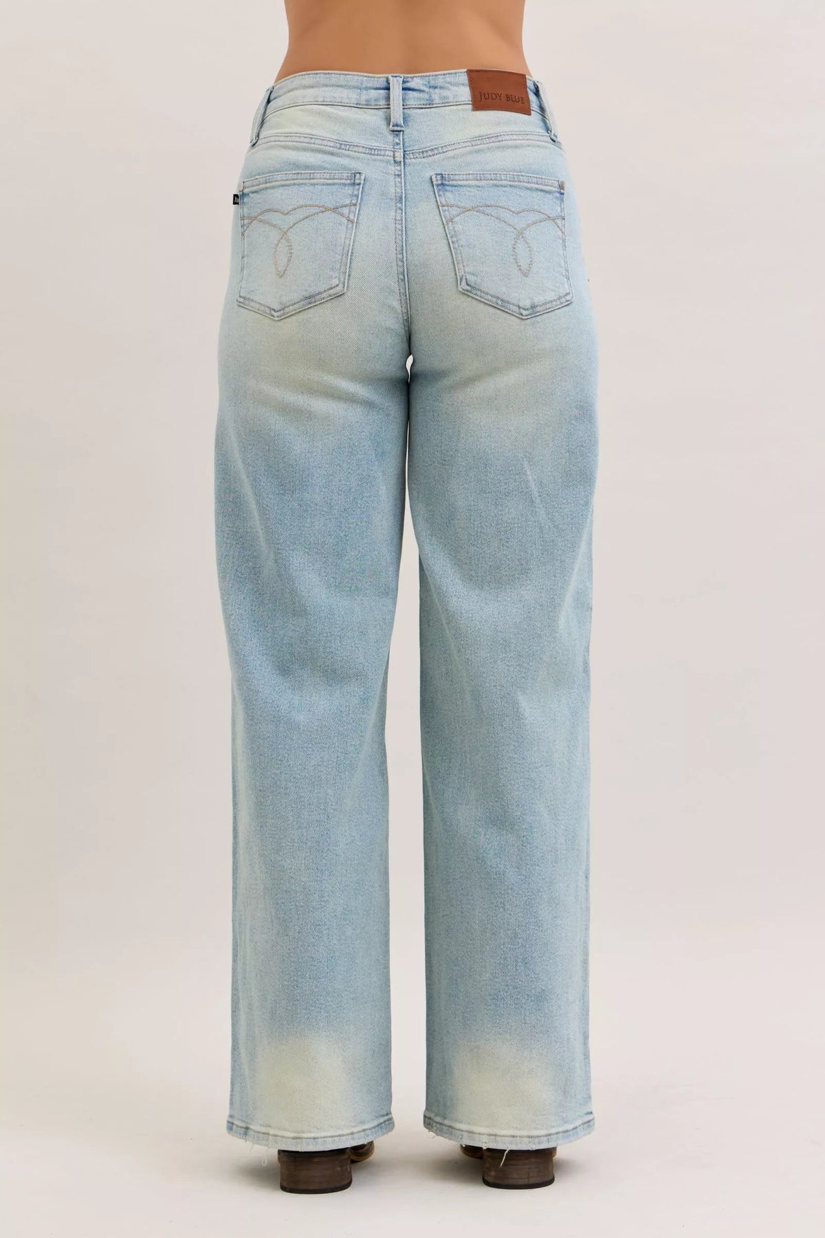 Judy Blue medium wash column jeans hem detail