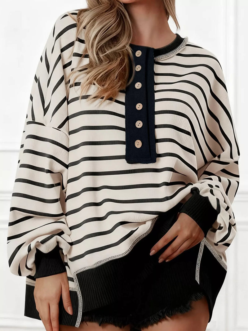 Beige striped button detail sweatshirt shown on model