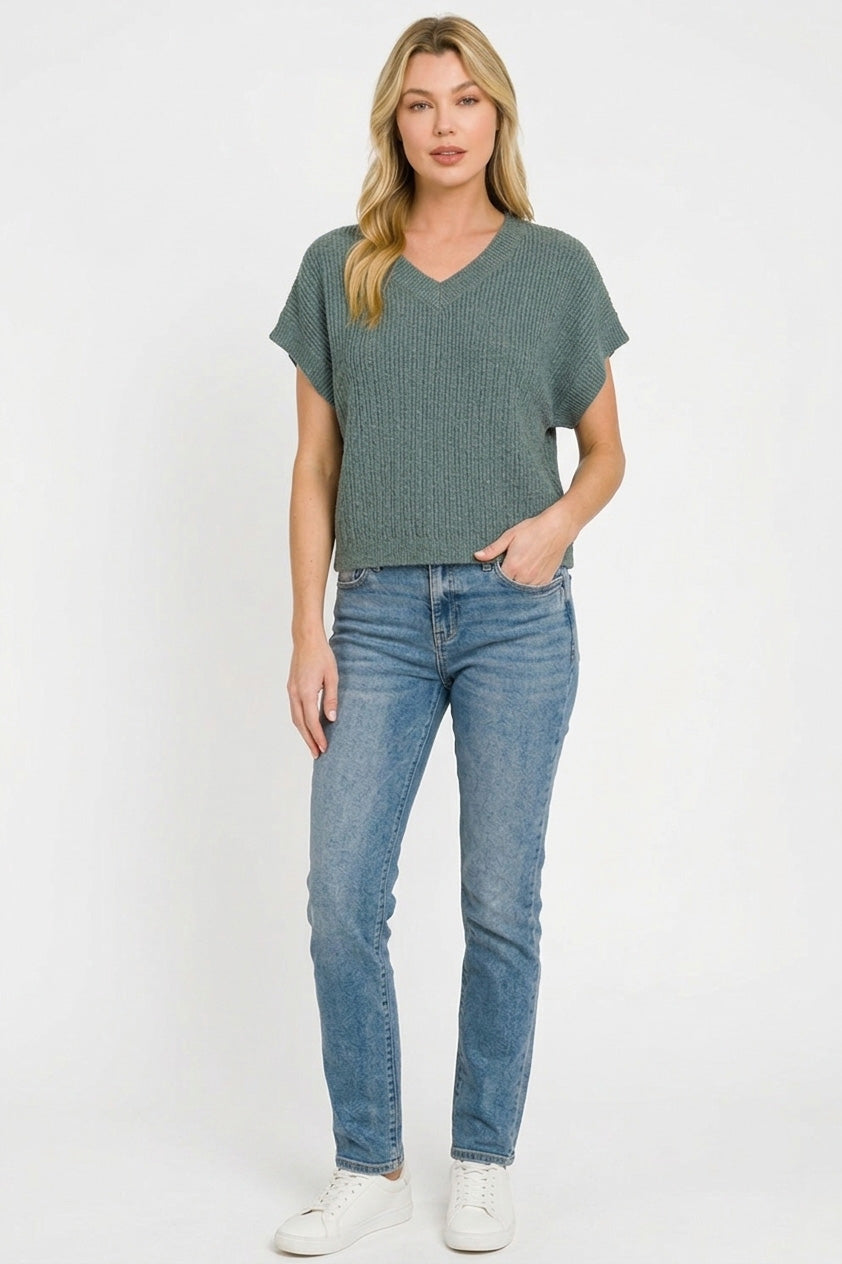 Jade cropped sweater styled with shorts