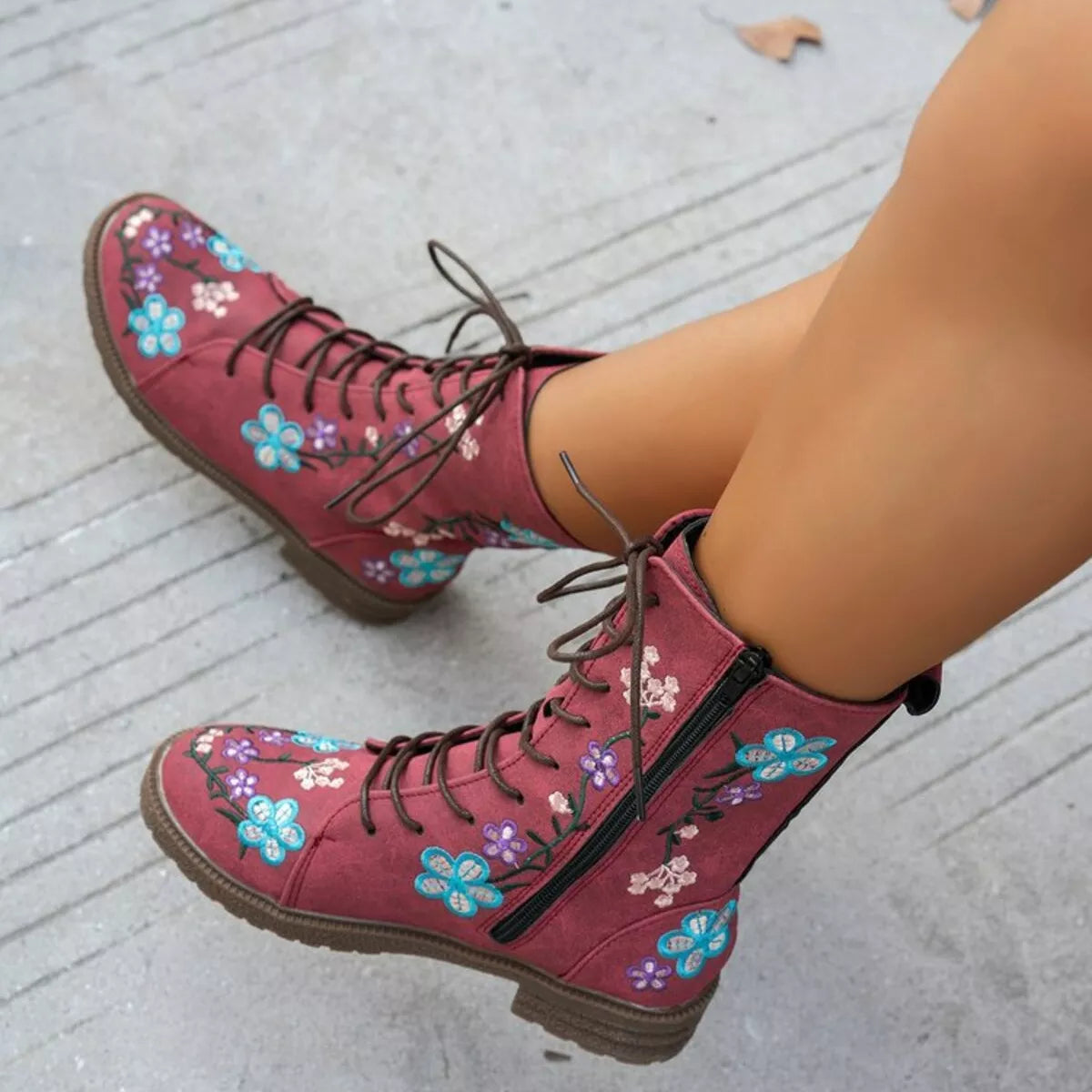 Round toe block heel ankle boots upper close up