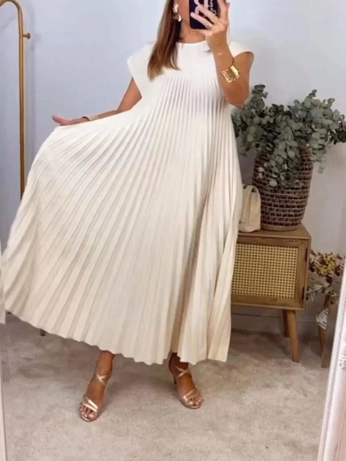 cream pleated round neck maxi dress with pockets side view