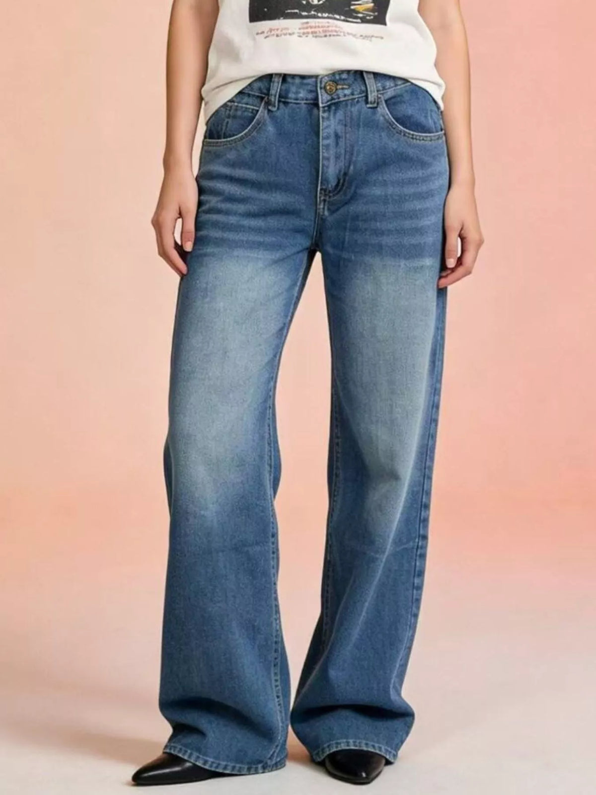 Vintage wash wide leg jeans front view in faded blue