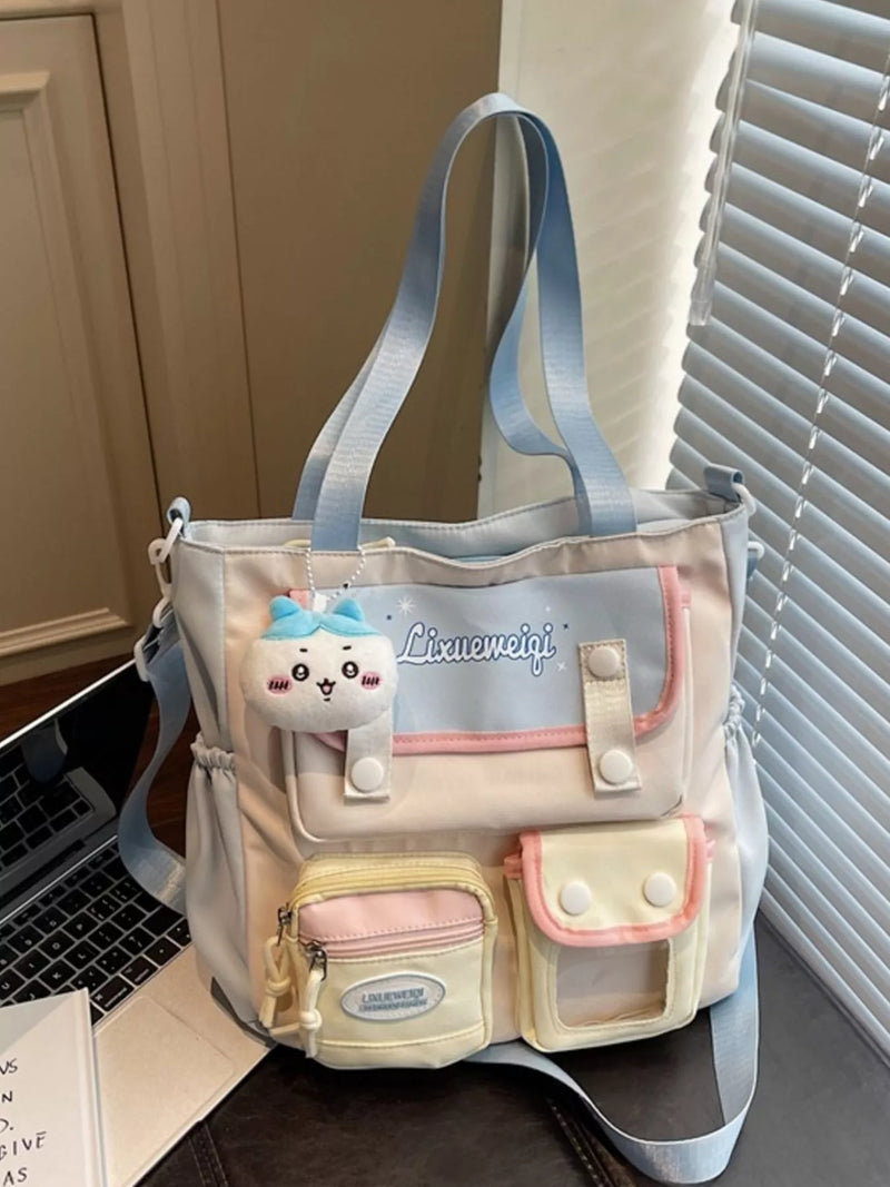 Pastel blue nylon multi pocket shoulder bag front view