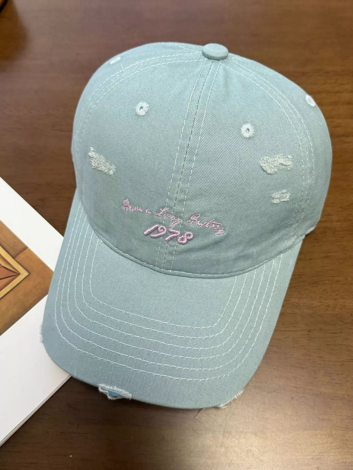 Light blue embroidered distressed baseball cap full length view