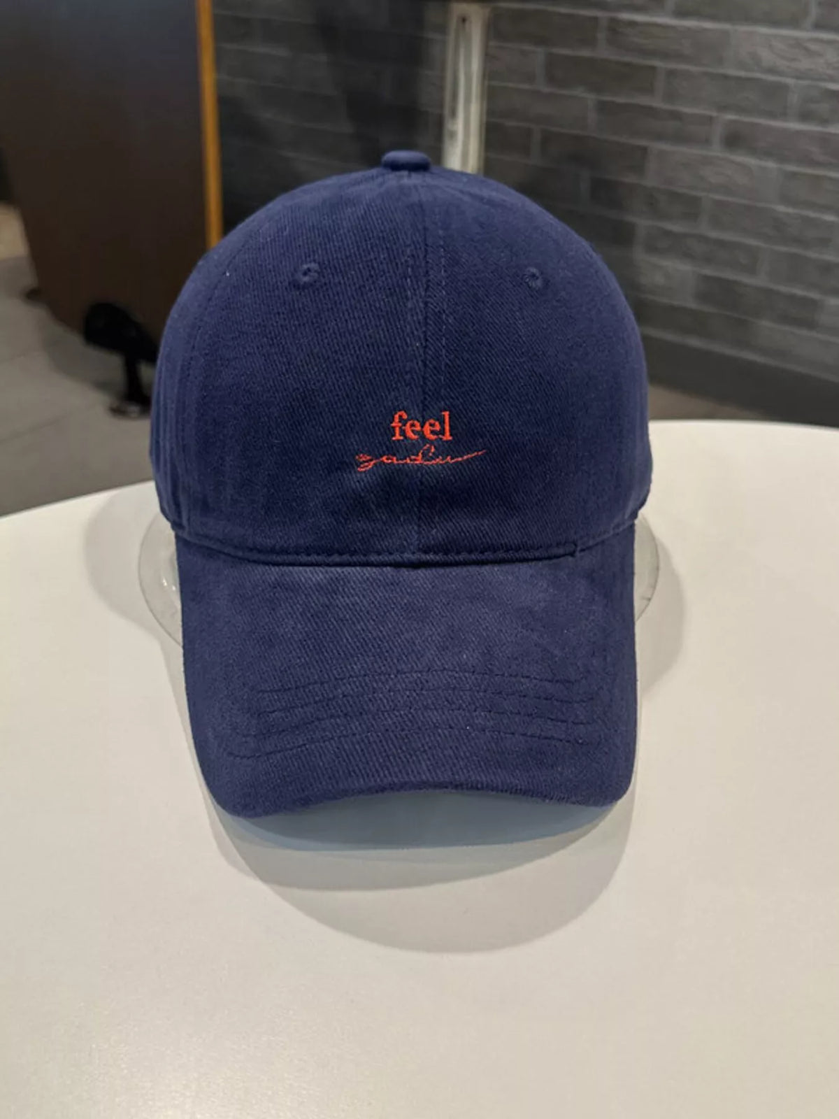 Cotton baseball cap brim and panel detail
