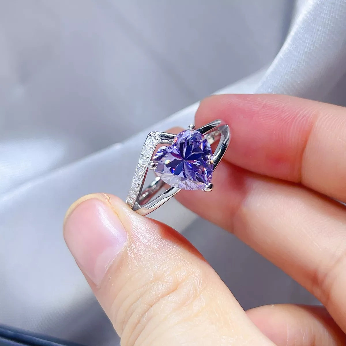 Side profile of the moissanite ring showing the band and setting height