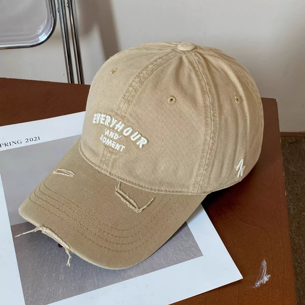 Distressed cap shown in a further colourway