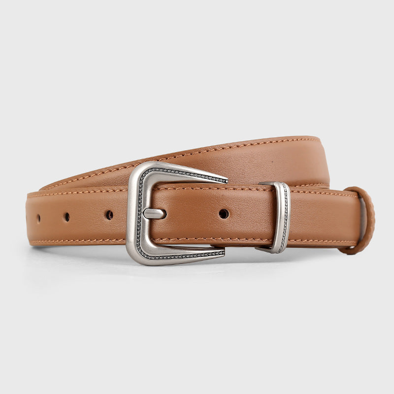 Leather belt coiled with buckle detail