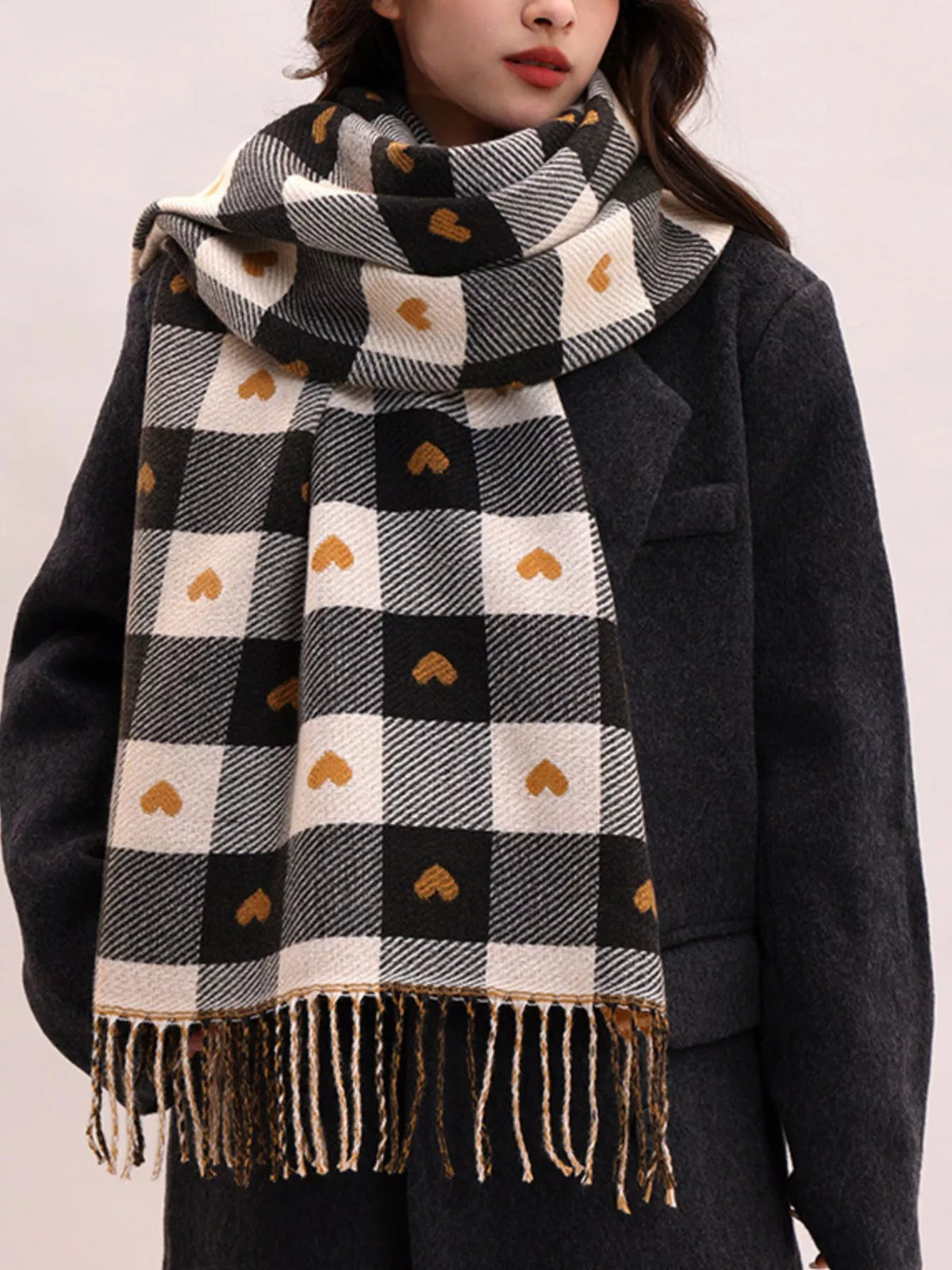 Cozy plaid womens scarf styled at the neck