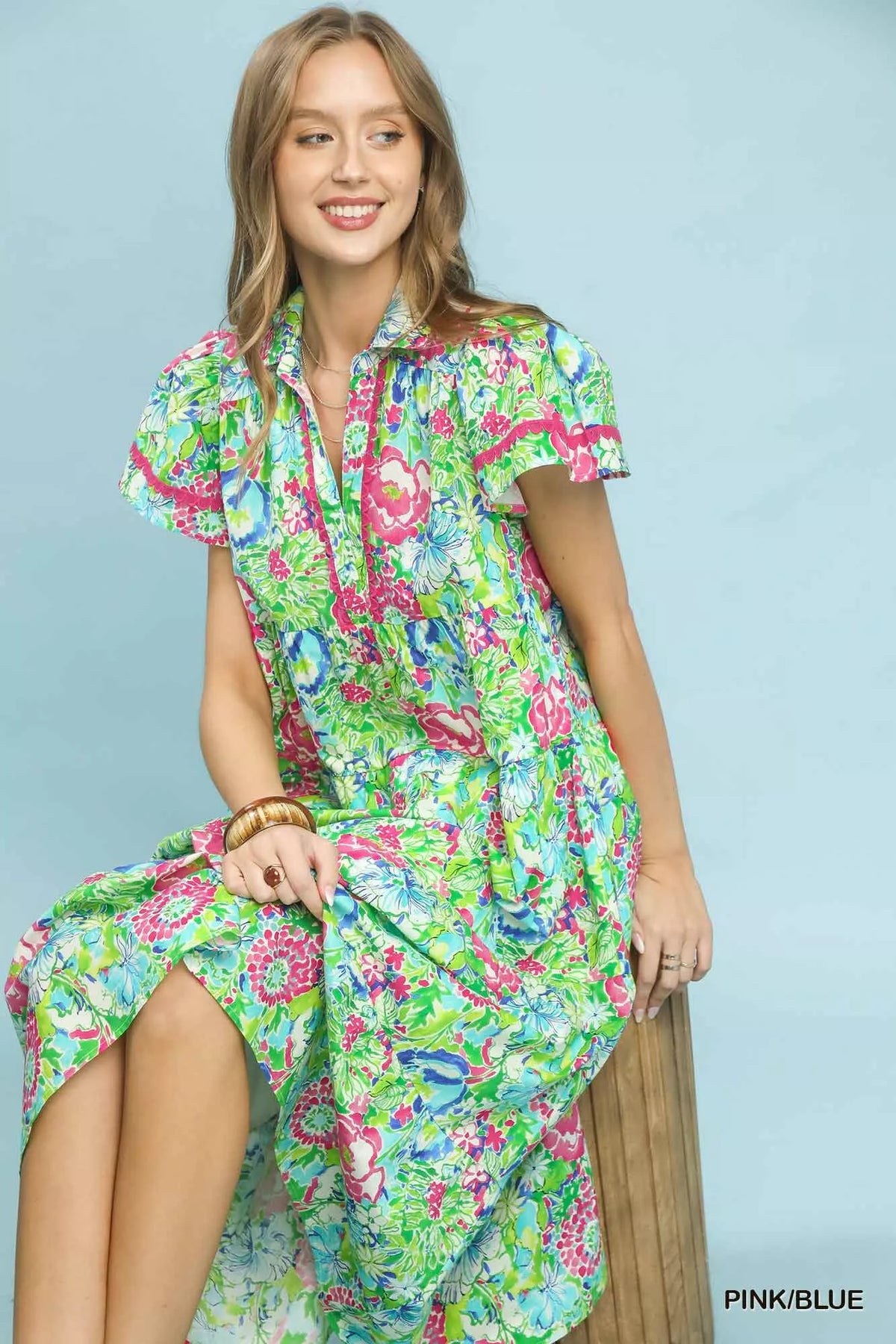 Pink and blue floral tiered midi dress detail view