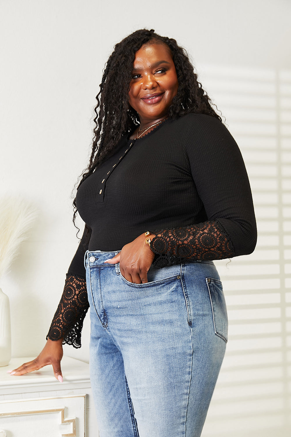 Double Take black crochet lace hem sleeve button top front view