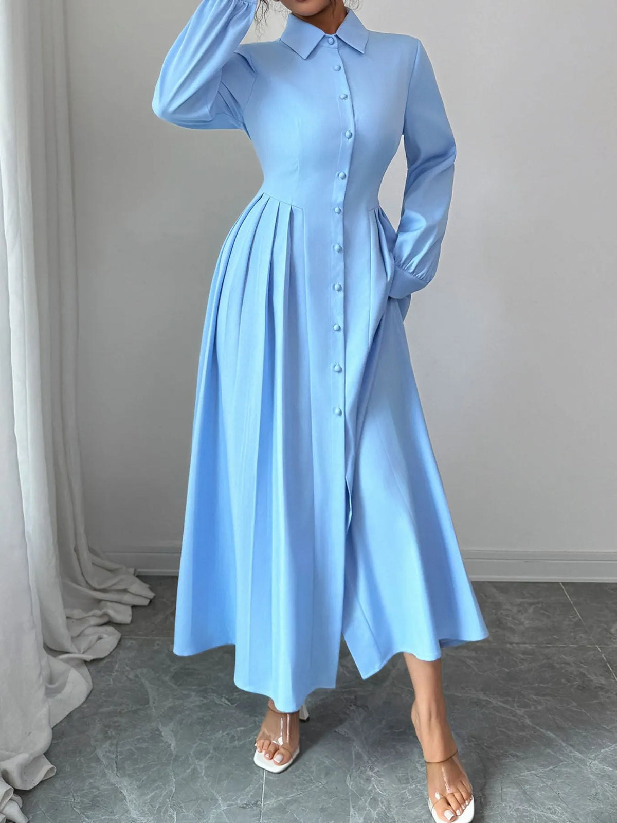 Side view of light blue maxi shirt dress
