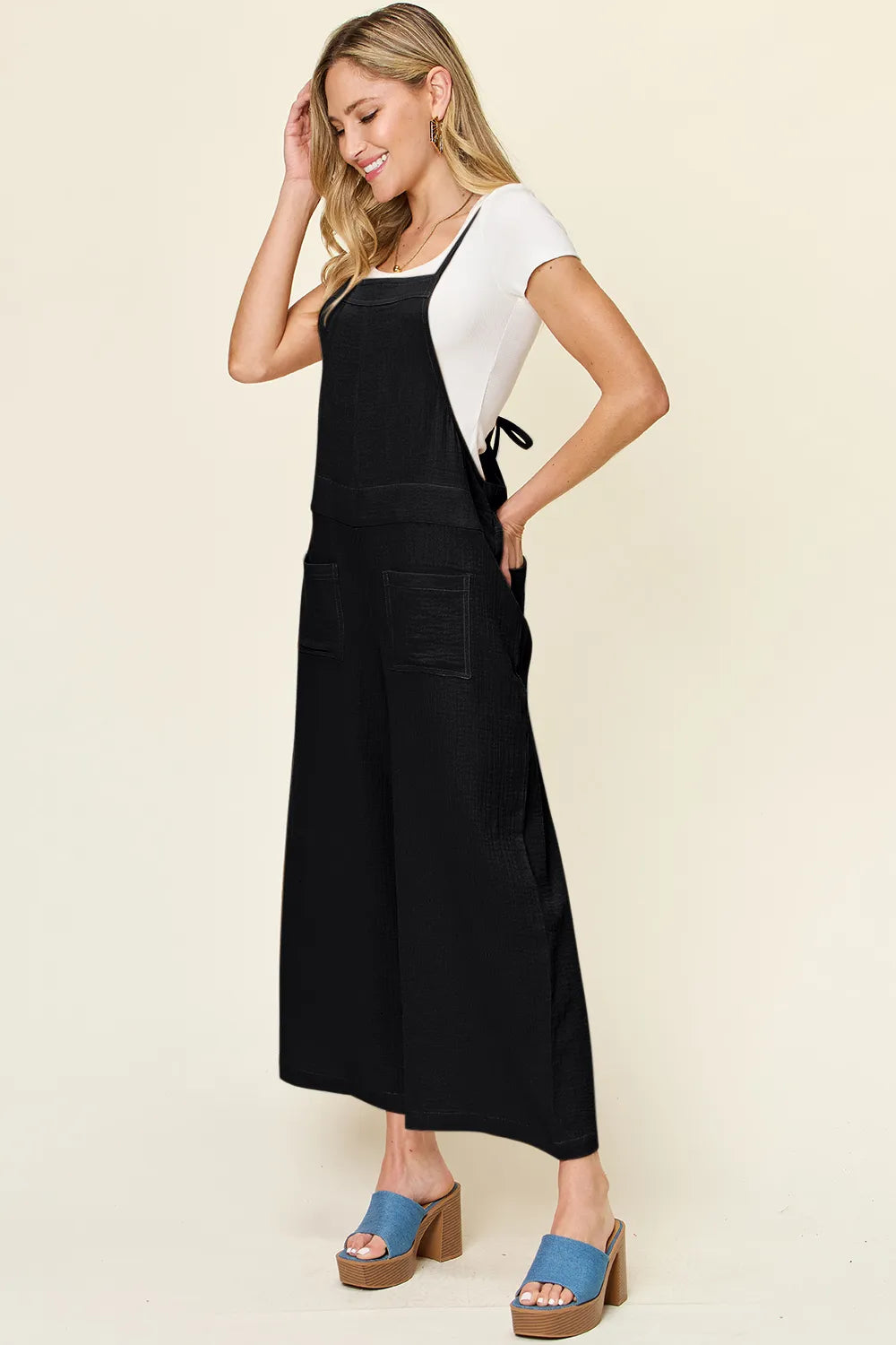 Full length view of the womens wide leg overall