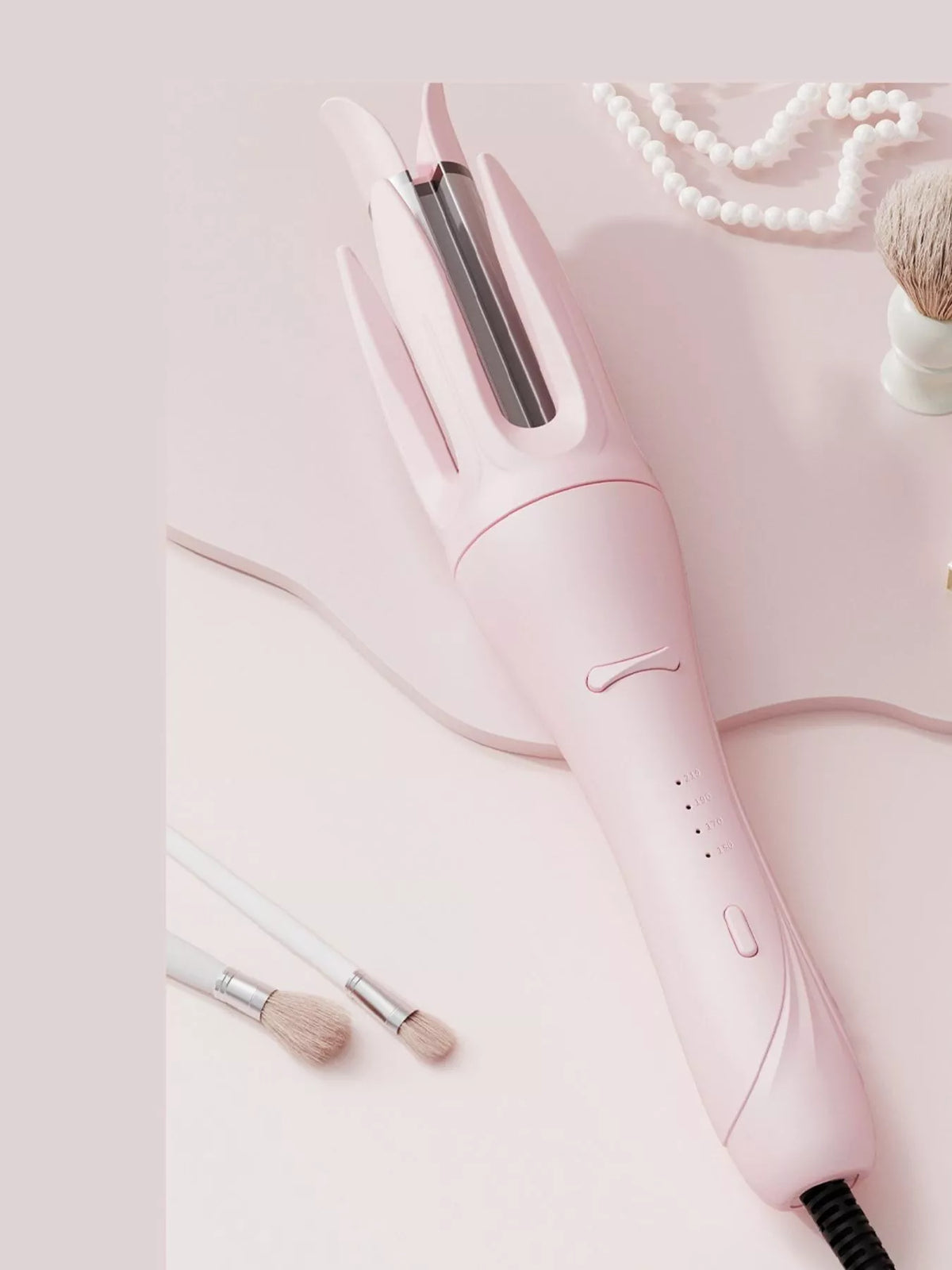 Curling iron control buttons detail